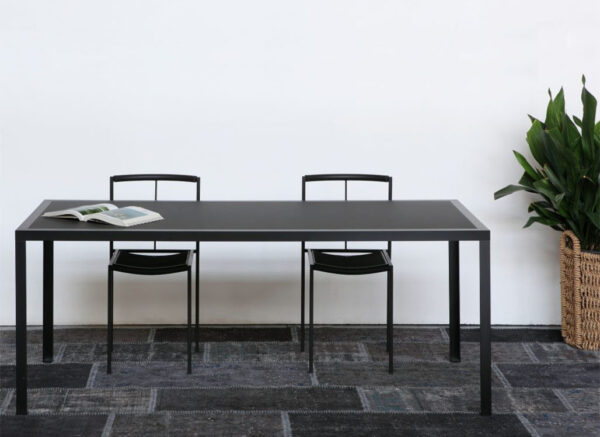 sleek black chairs with black table set