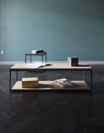 a simple coffee table with a steel body.