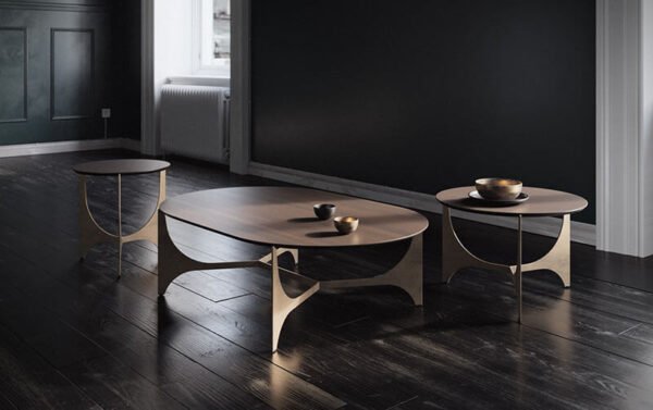 three designs depicted of the oscar coffee table, a table with a metallic build and an Isola-type surface