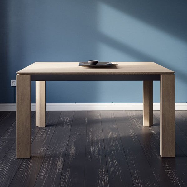 the fiori table with wooden legs and steel crossbeams.