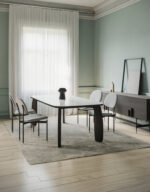 the organic table with solid wooden legs and an Isola-type surface
