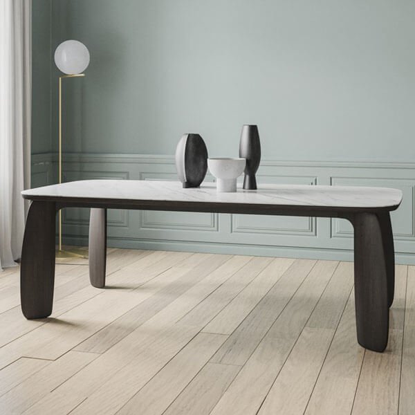 the organic table with solid wooden legs and an Isola-type surface