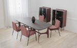 the oscar table with a metallic build and an Isola-type surface