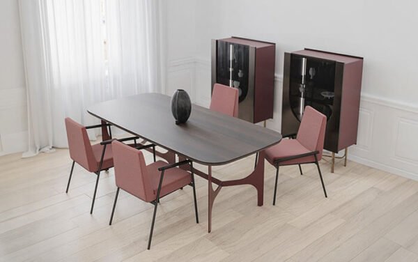 the oscar table with a metallic build and an Isola-type surface