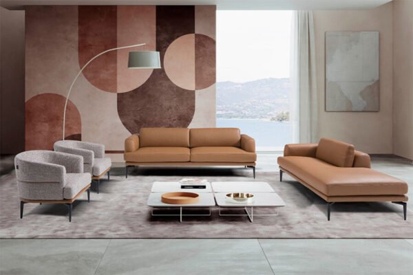 the tiago sofa has a patented manual mechanism, adjustable-height and a backrest which allows for a deeper seat. Its clean, minimalist lines, combined with tall metal legs, create a suspended effect that enhances visual lightness, making it a standout piece in modern interiors.