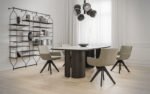 solido table, a wooden-legged table with metallic finishes and an Isole-type surface.