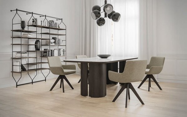solido table, a wooden-legged table with metallic finishes and an Isole-type surface.