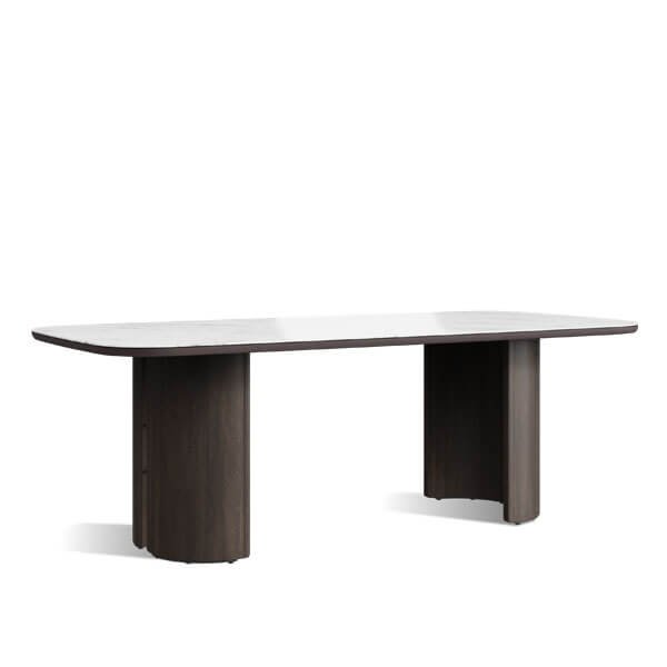 solido table, a wooden-legged table with metallic finishes and an Isole-type surface.