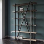A bookcase with a steel frame and wooden shelves.
